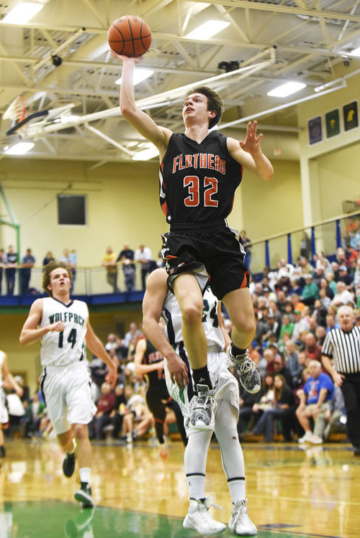 Flathead's Tyler Johnson soars in for a layup against Glacier during the second quarter. (Aaric Bryan/Daily Inter Lake)