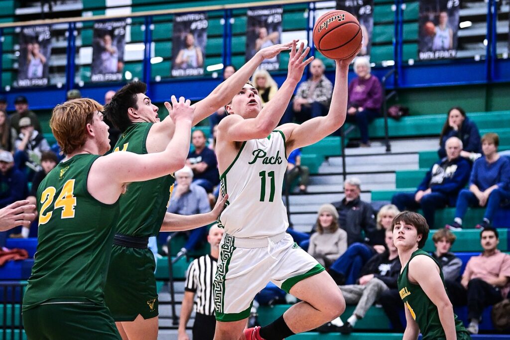 Glacier's Asher Knopik (11) drives to the basket in the third quarter against Great Falls CMR at Glacier High School on Friday, Dec. 13. (Casey Kreider/Daily Inter Lake)