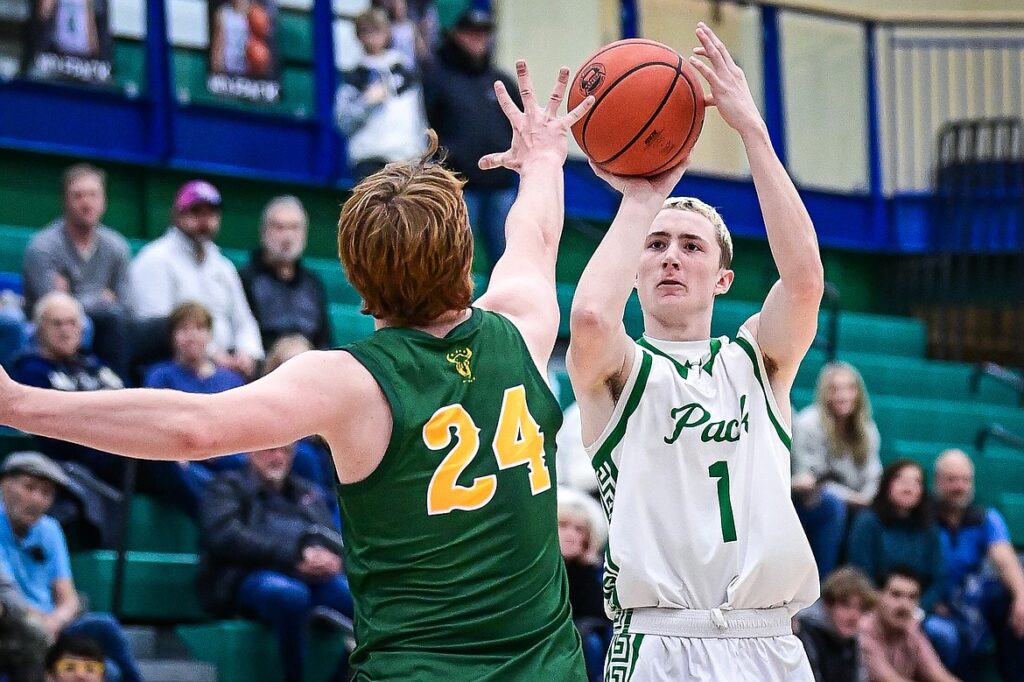 Glacier's Cooper Pelc (1) shoots in the first quarter against Great Falls CMR at Glacier High School on Friday, Dec. 13. (Casey Kreider/Daily Inter Lake)